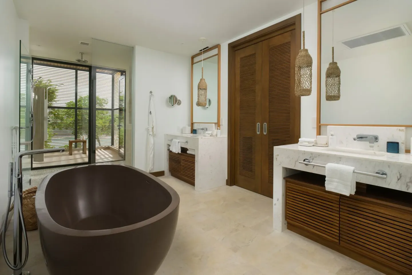 Bathroom with soaking tub and twin vanities at Four Seasons Resort Peninsula Papagayo, Costa Rica.