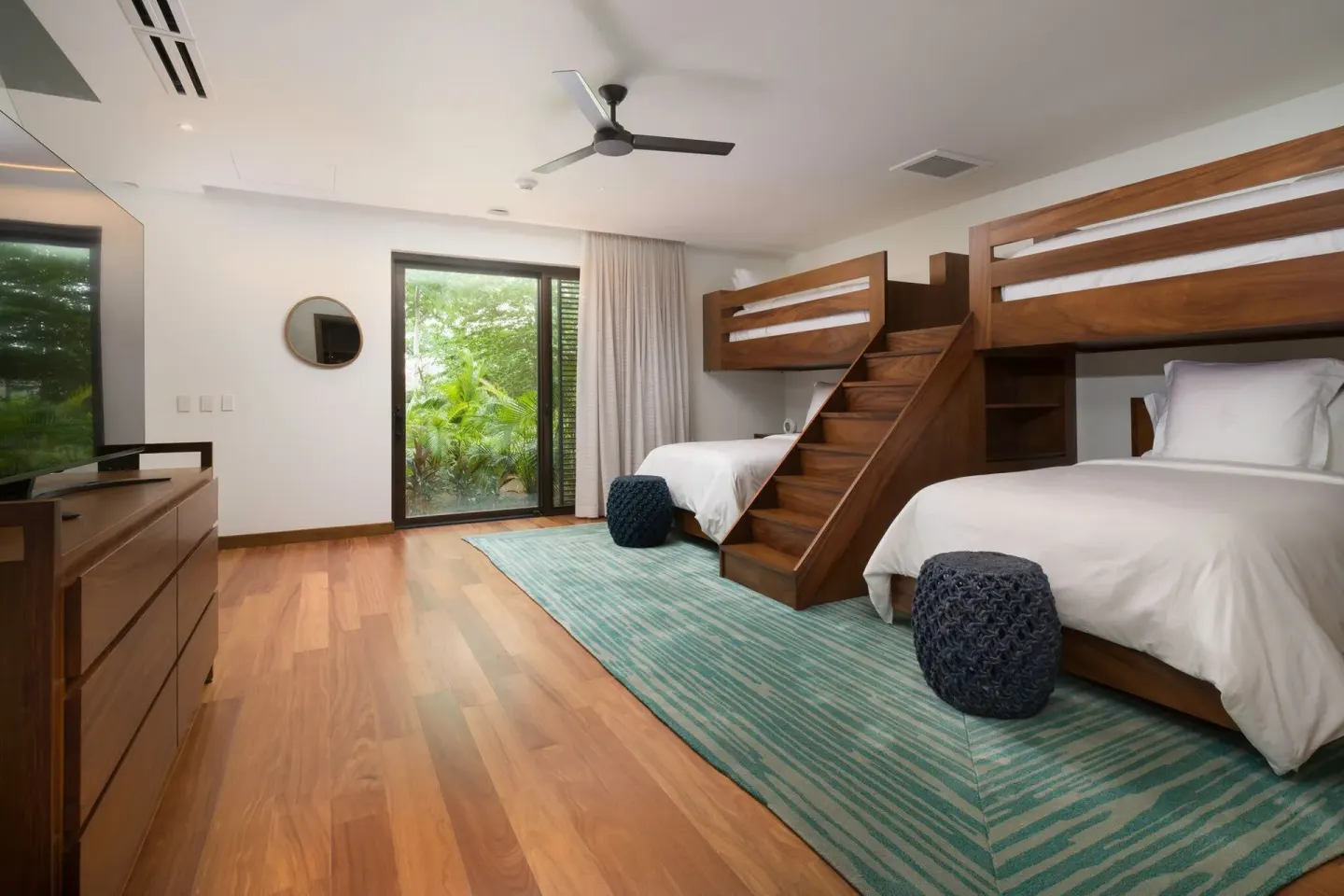 Bunk bedroom with two lower beds at Four Seasons Resort Peninsula Papagayo, Costa Rica.