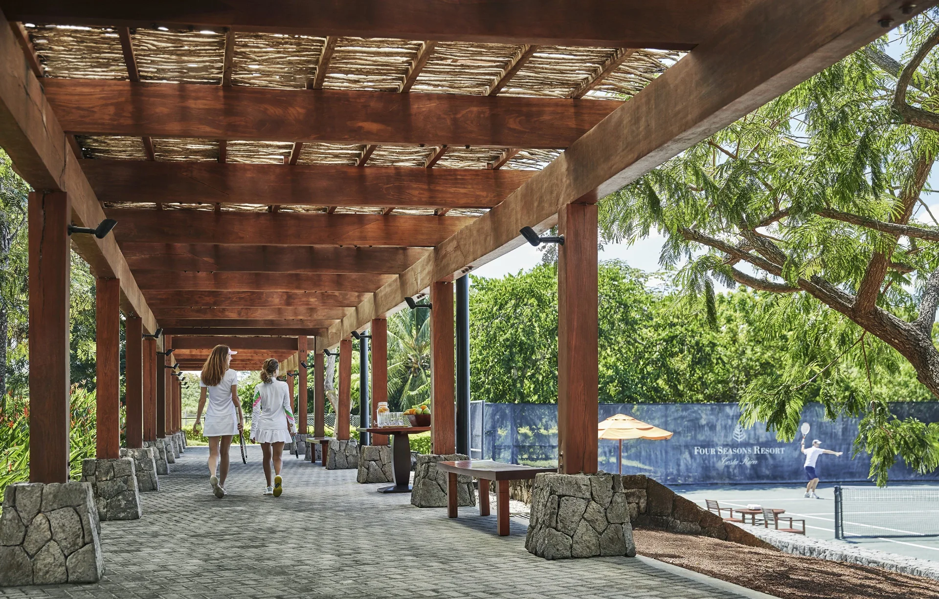Covered walkway beside tennis courts at Four Seasons Resort Peninsula Papagayo, Costa Rica.