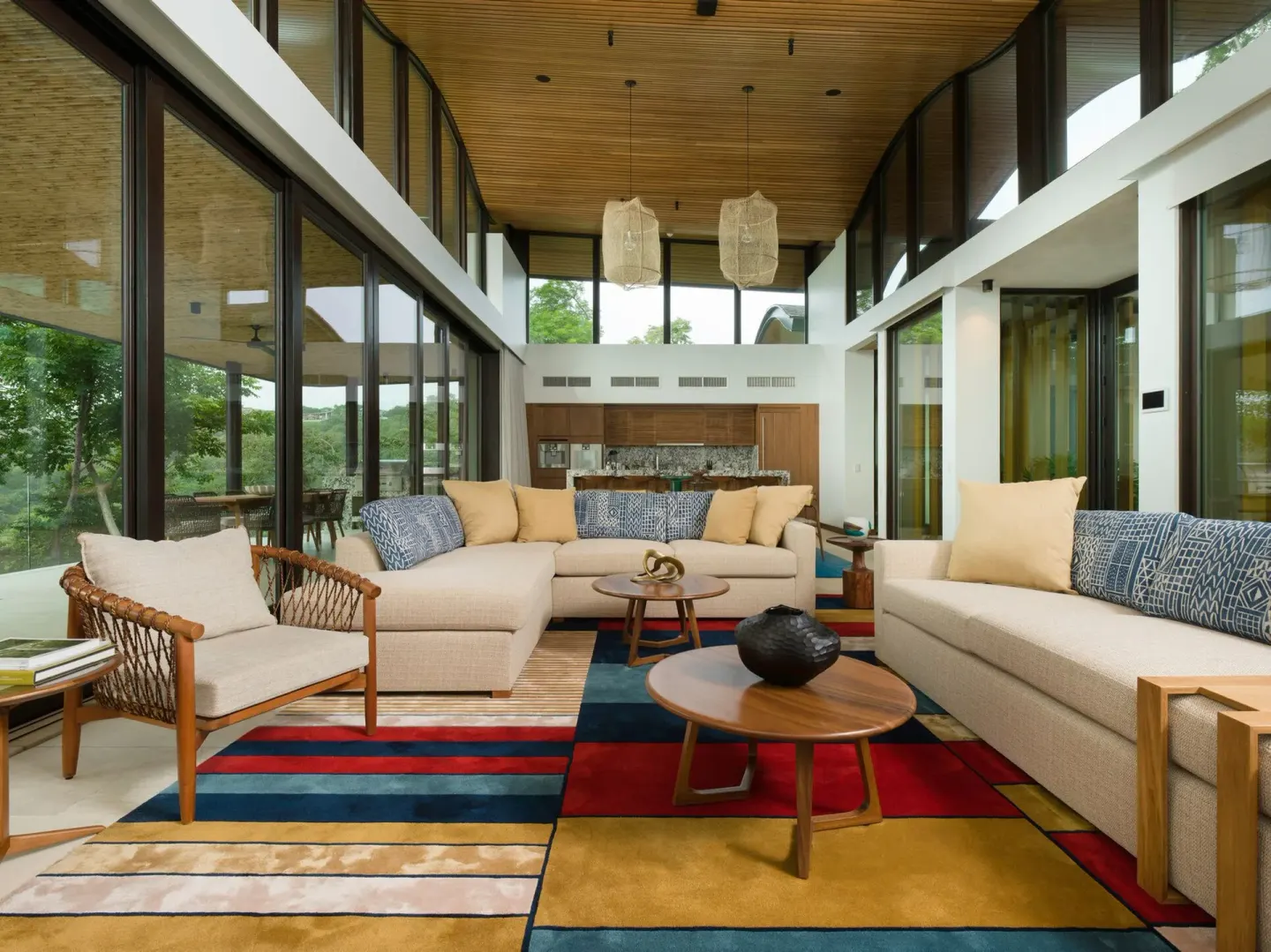 Glass-walled resort living room at Four Seasons Resort Peninsula Papagayo, Costa Rica.