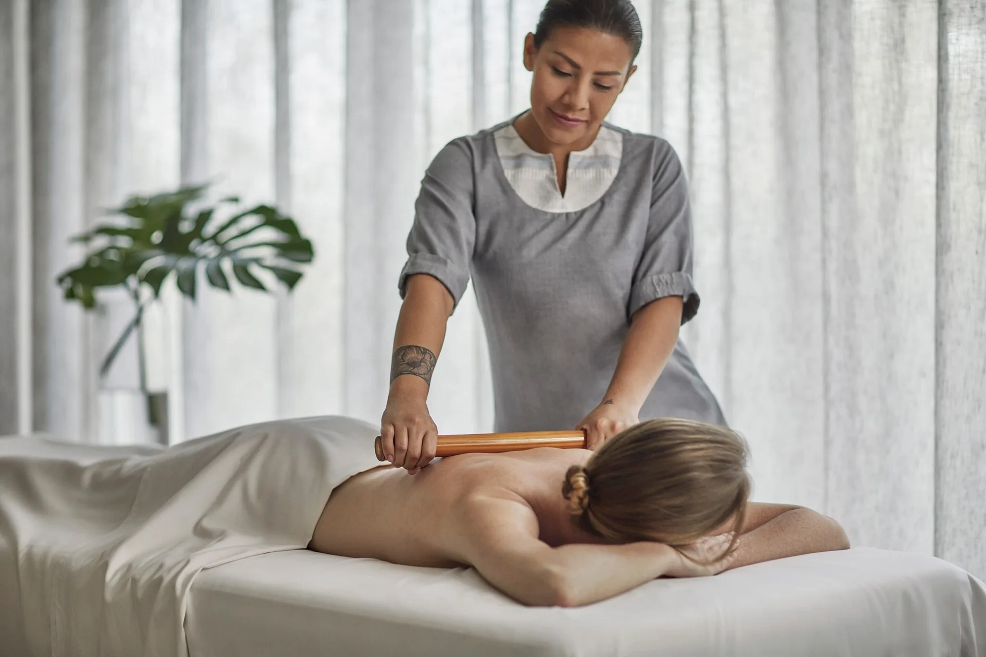 Spa therapist gives a massage at Four Seasons Resort Peninsula Papagayo, Costa Rica.