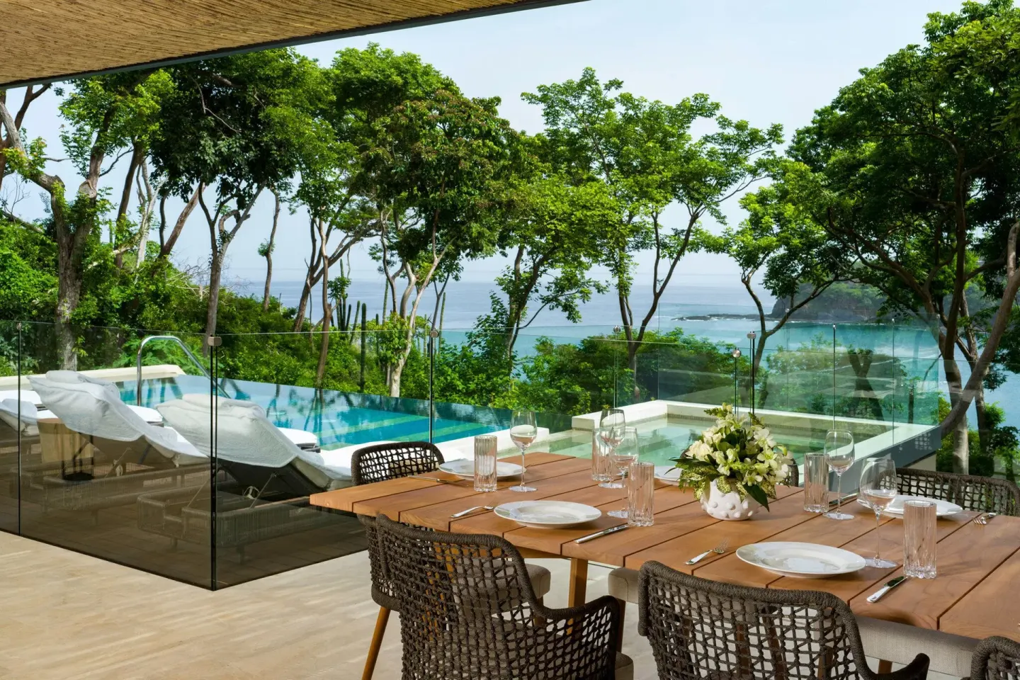 Terrace dining table beside a private pool at Four Seasons Resort Peninsula Papagayo, Costa Rica.
