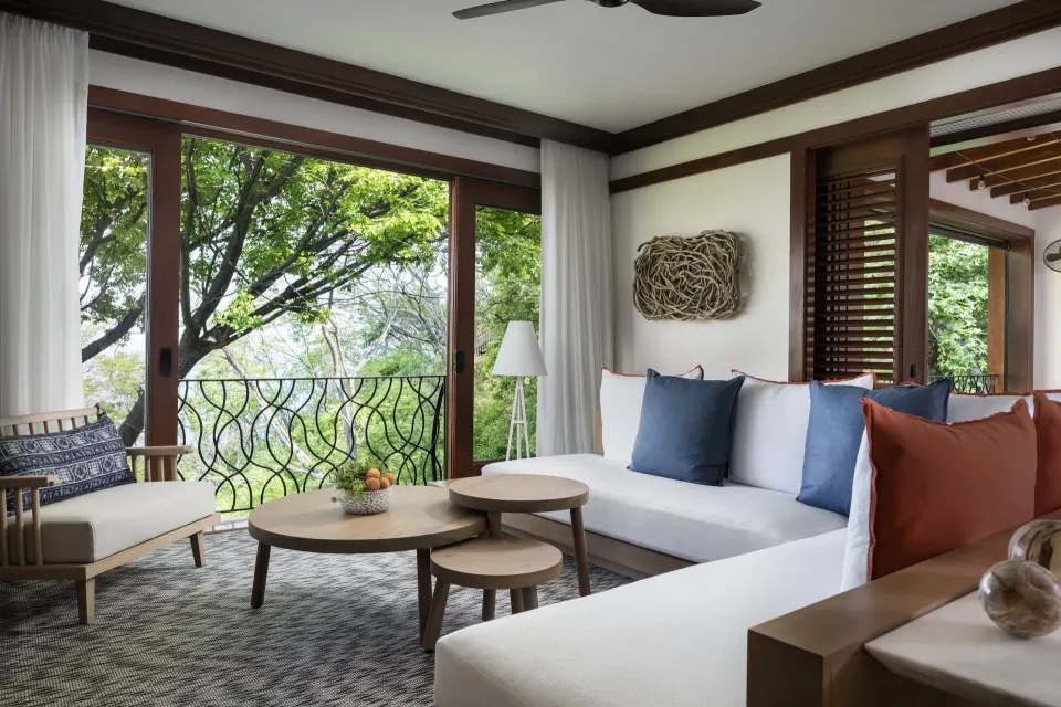 Pacifico Residence living room sofa and balcony at Four Seasons Resort Peninsula Papagayo, Costa Rica.