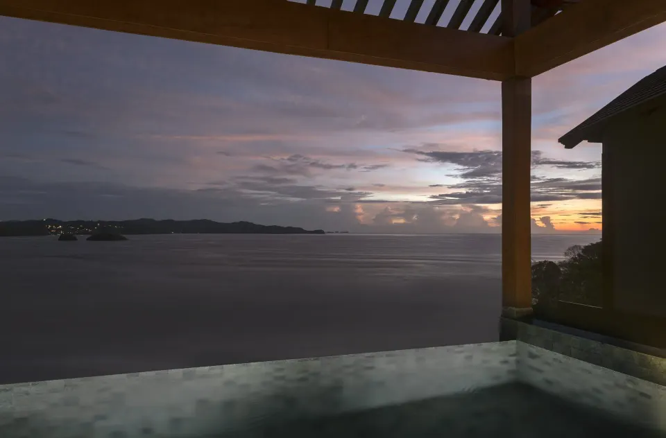 Villa plunge pool at sunset at Four Seasons Resort Peninsula Papagayo, Costa Rica.