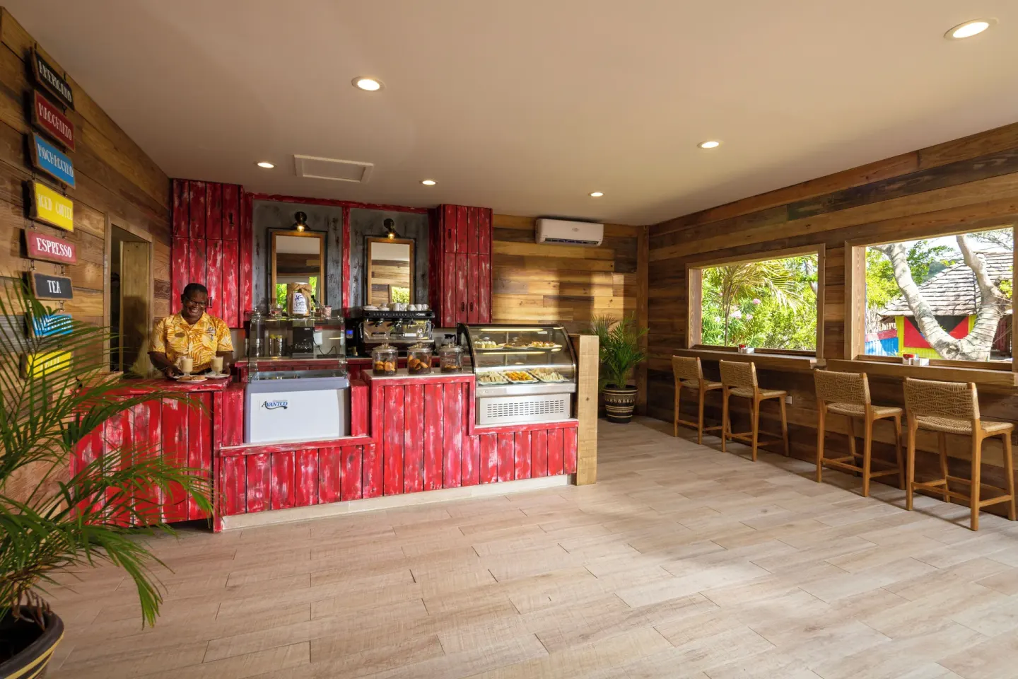 Coffee shop counter with indoor seating at Galley Bay Resort & Spa.