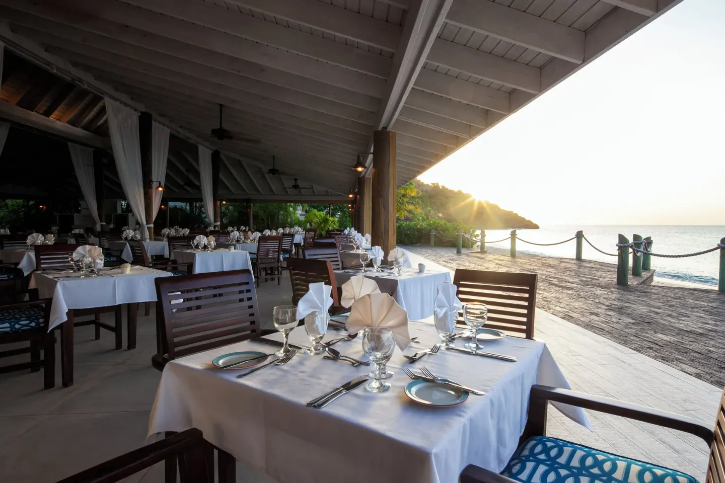 Open-air oceanfront dining room at Galley Bay Resort & Spa.