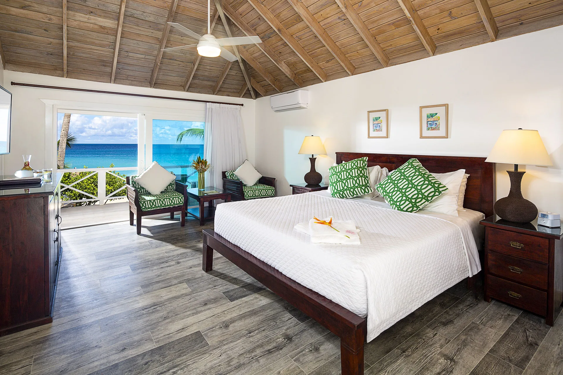 Deluxe Beachfront king bed room with ocean view at Galley Bay Resort & Spa.