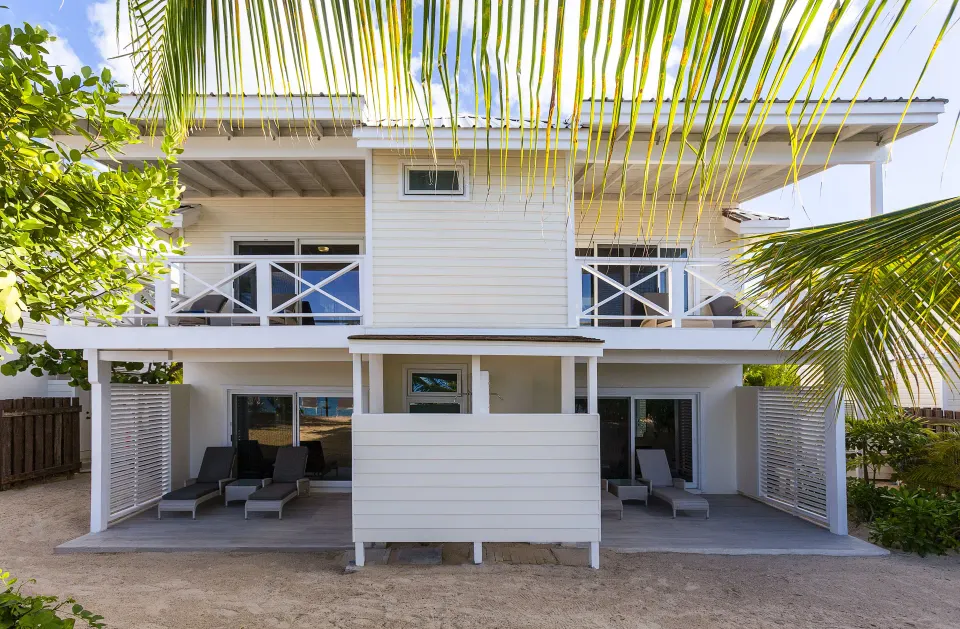 Deluxe Beachfront room building exterior with balconies at Galley Bay Resort & Spa.