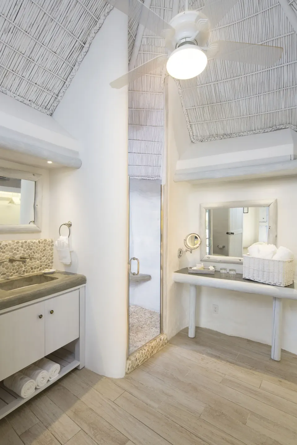 Gauguin Suite bathroom with vanity and shower at Galley Bay Resort & Spa.