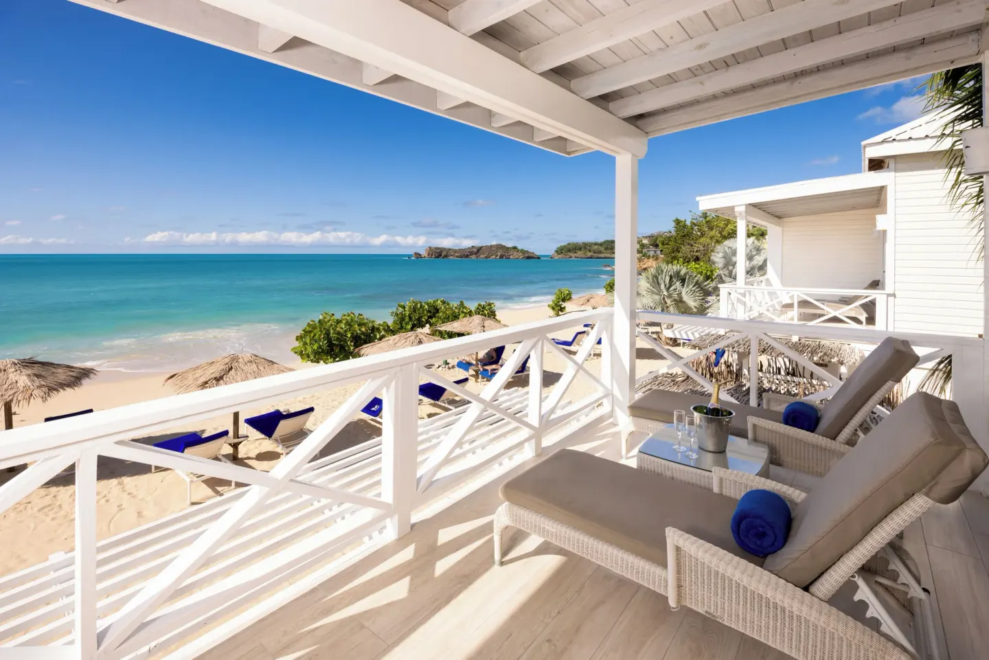 Premium Beachfront Suite balcony with sea view at Galley Bay Resort & Spa.