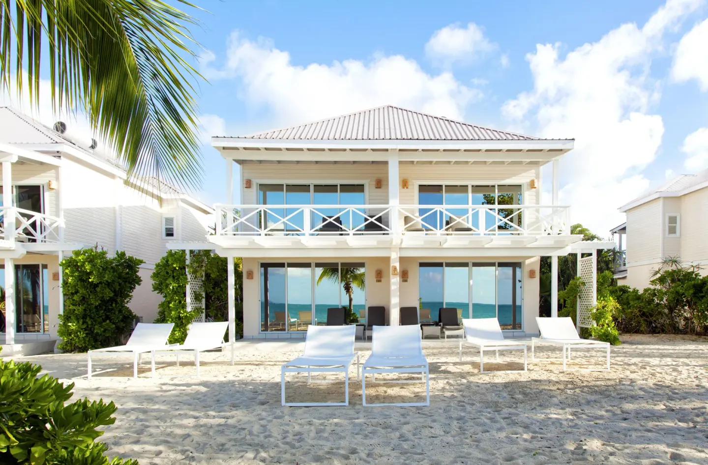 Premium Beachfront Suite exterior on the sand at Galley Bay Resort & Spa.