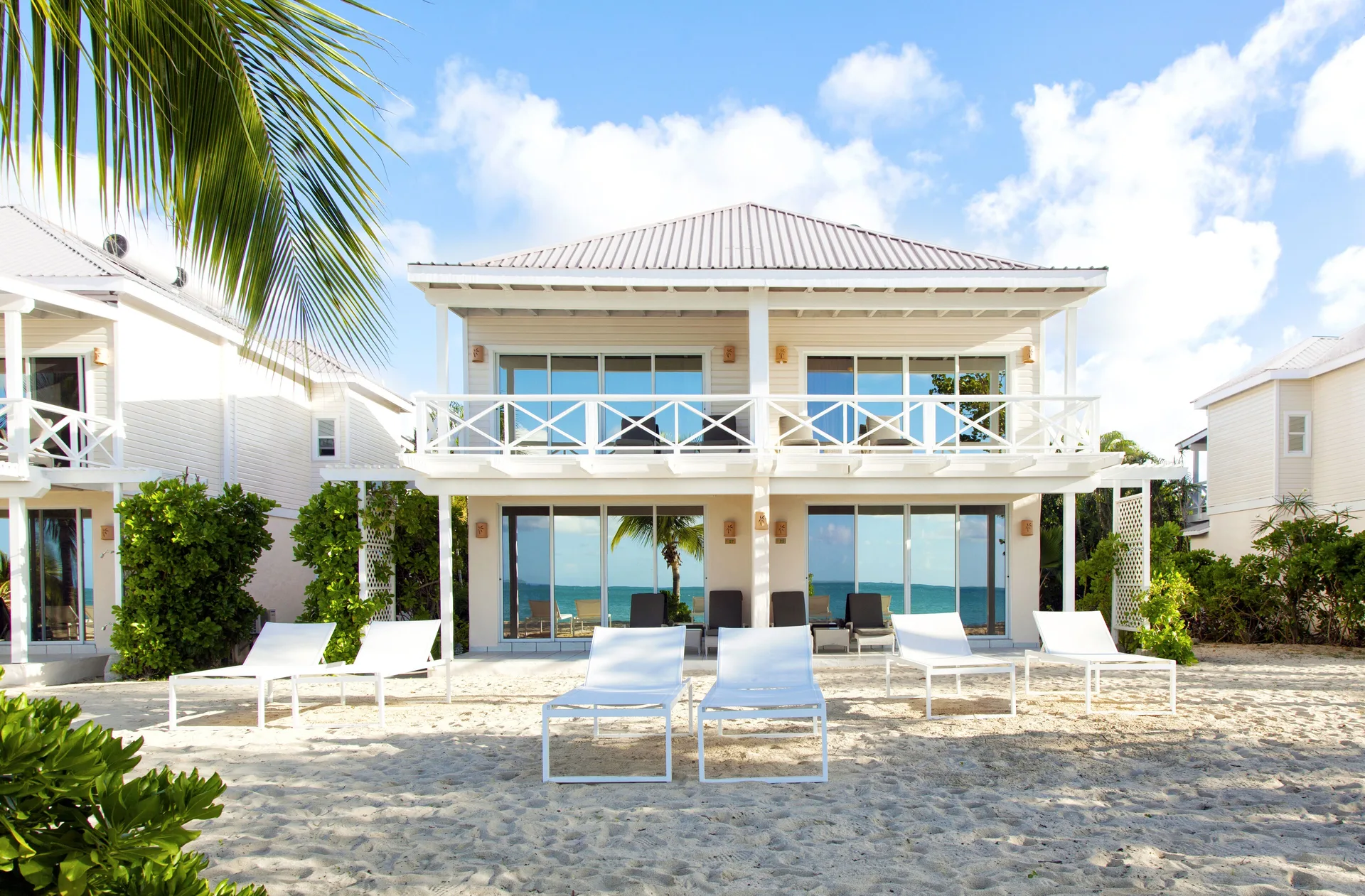 Premium Beachfront Suite exterior on the sand at Galley Bay Resort & Spa.