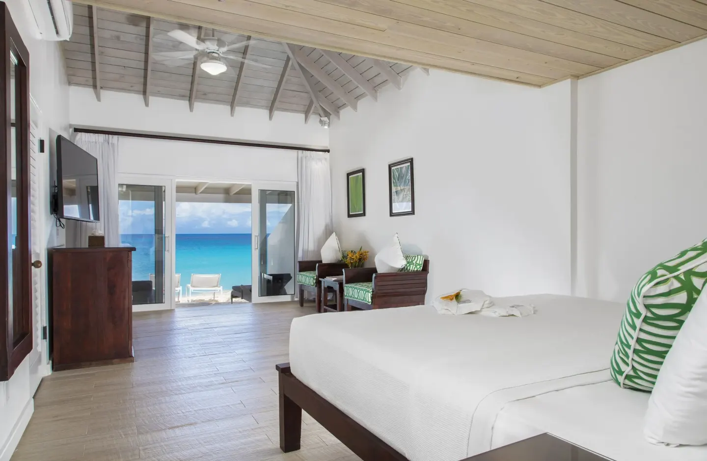 Superior Deluxe Beachfront room with ocean-facing terrace at Galley Bay Resort & Spa.