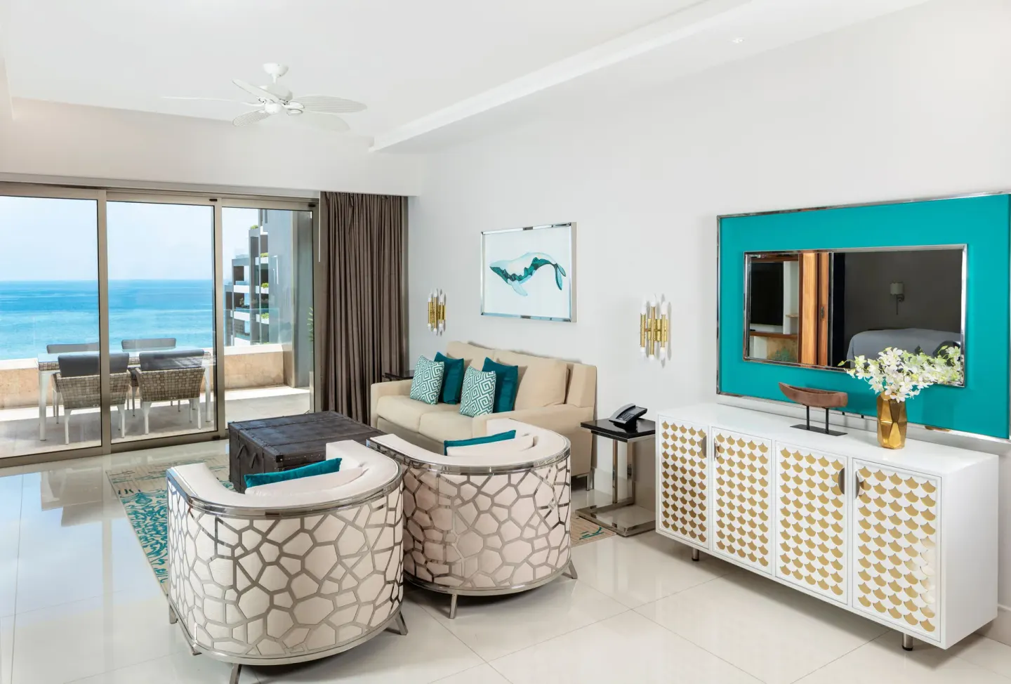 Ocean-view living room in the Two Bedroom Suite at Garza Blanca Los Cabos.
