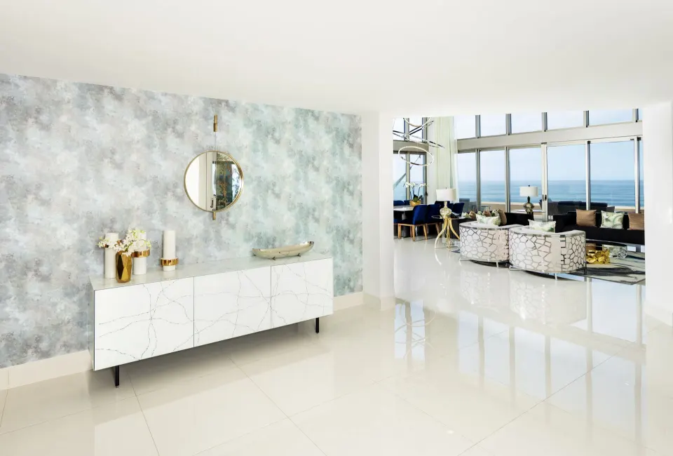 Penthouse entry console at Garza Blanca Los Cabos looking into the oceanfront living room.