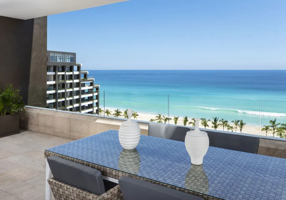 Loft Ocean View balcony dining table overlooking the ocean at Garza Blanca Los Cabos.