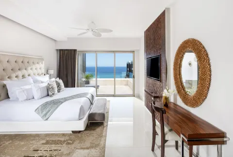 Loft Ocean View bedroom with king bed and balcony at Garza Blanca Los Cabos.
