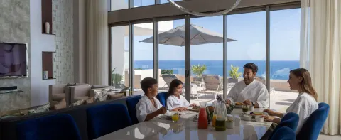 Loft Ocean View dining area with terrace and ocean beyond at Garza Blanca Los Cabos.