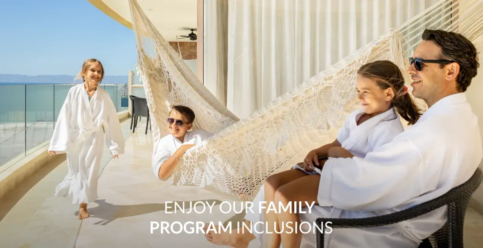 Family on the balcony of a 2 Bedroom Suite Panoramic at Garza Blanca Preserve Resort & Spa.