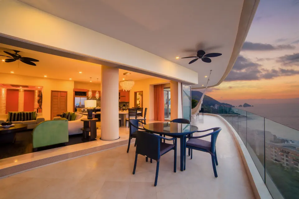 Curved balcony of a 2 Bedroom Suite Panoramic at Garza Blanca Preserve Resort & Spa.