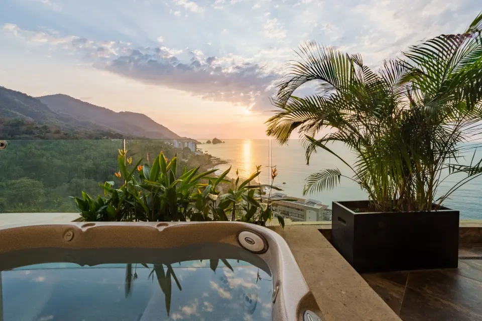 Terrace hot tub with ocean sunset view in the 2 Bedroom Suite Panoramic at Garza Blanca Preserve Resort & Spa.