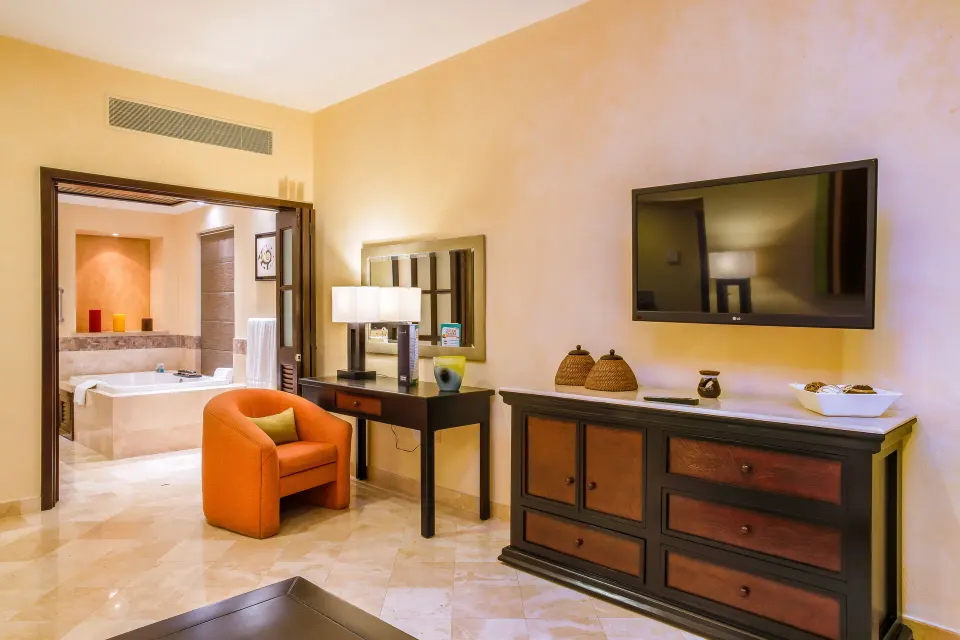 Honeymoon Suite sitting area and bathroom entrance at Garza Blanca Preserve Resort & Spa.