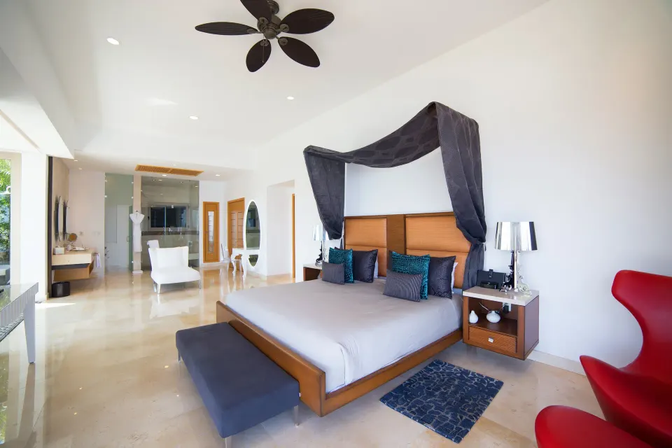 Grand Penthouse bedroom with king bed at Garza Blanca Preserve Resort & Spa.