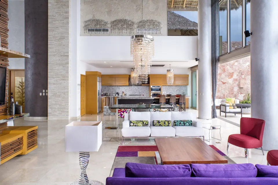Grand Penthouse living room and kitchen at Garza Blanca Preserve Resort & Spa.