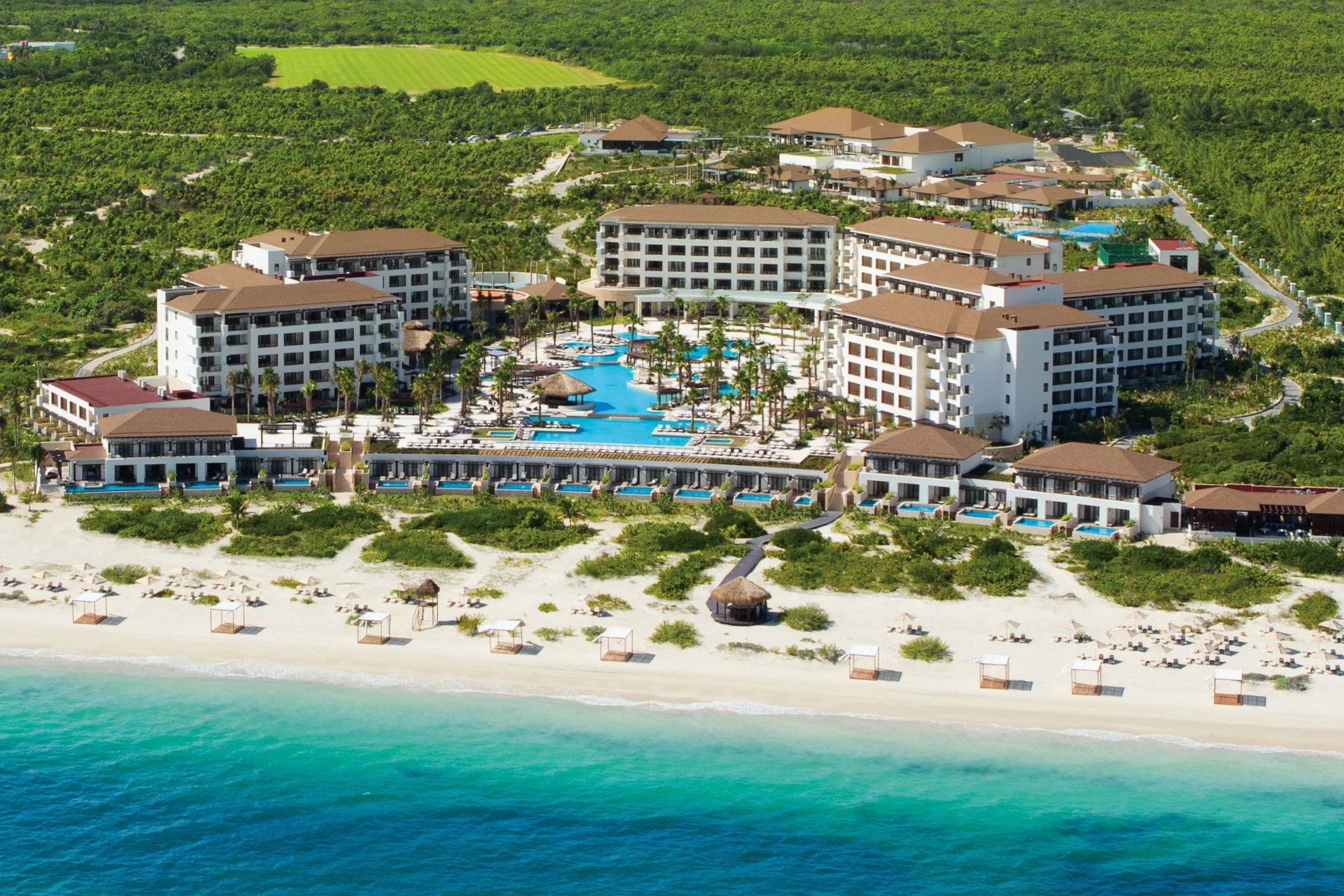 Secrets Playa Mujeres Golf & Spa Resort adults-only all-inclusive with beach and golf setting