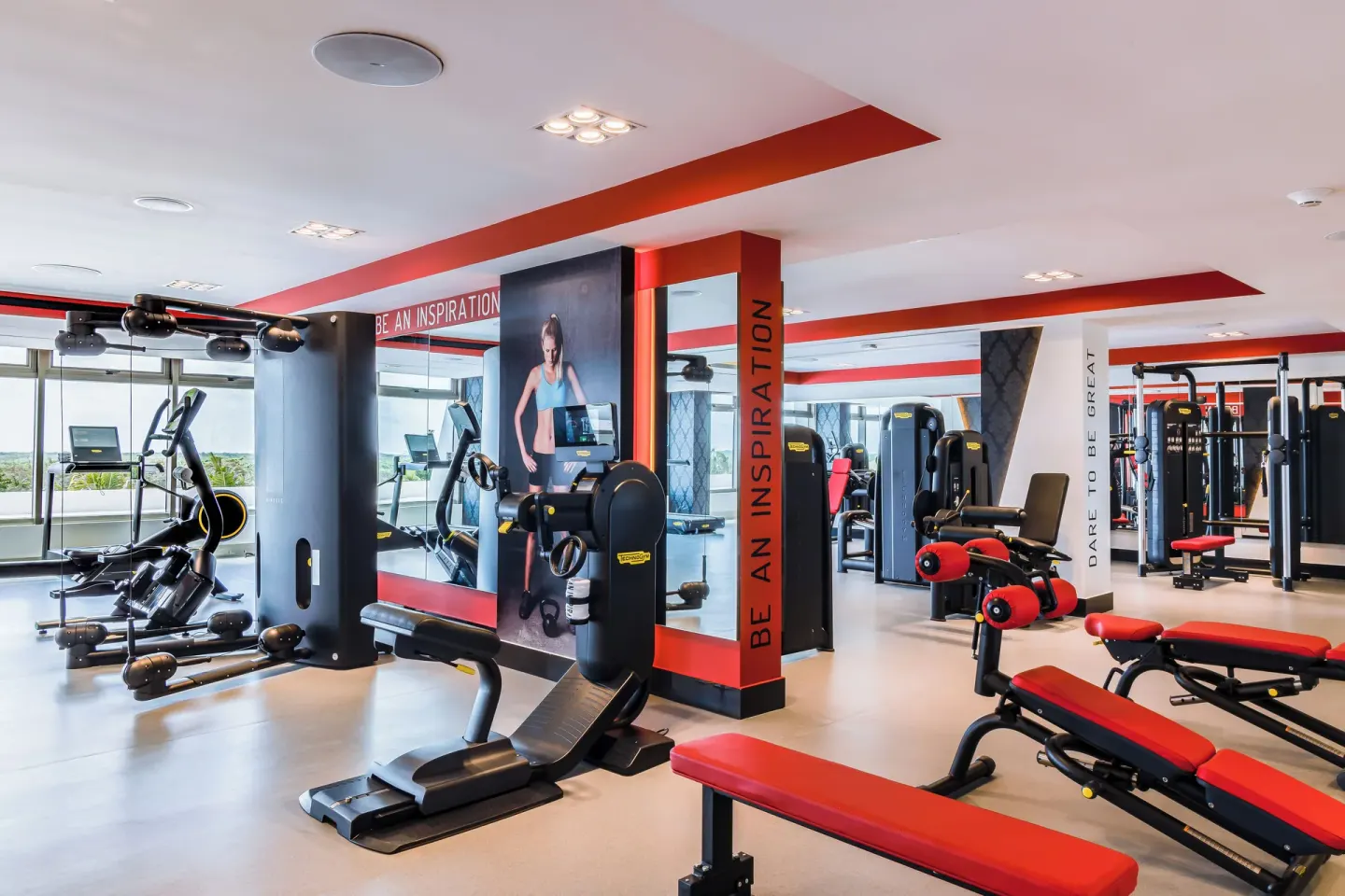 Fitness center with cardio and strength machines at Garza Blanca Resort & Spa Cancun.