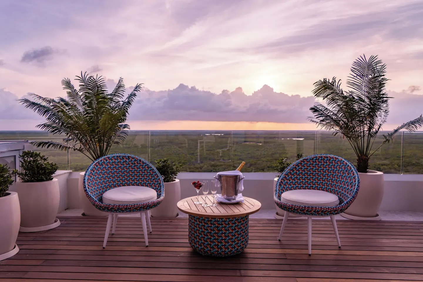 Rooftop terrace seating at sunset at Garza Blanca Resort & Spa Cancun.