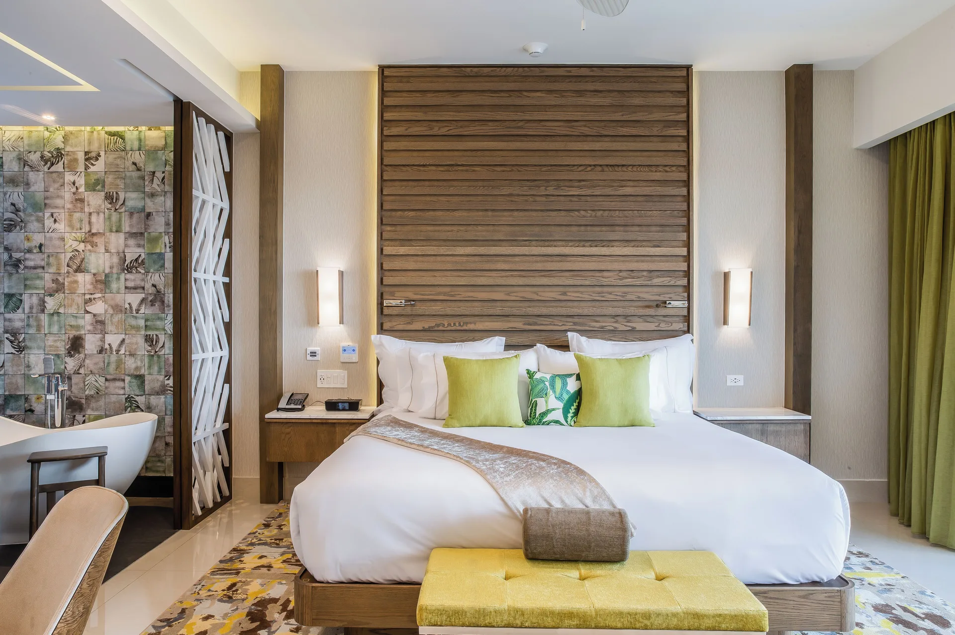 Junior Suite Ocean View king bed and open bath at Garza Blanca Resort & Spa Cancun.