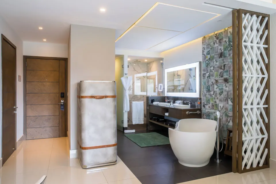 Junior Suite bathroom with soaking tub and double vanity at Garza Blanca Resort & Spa Cancun.