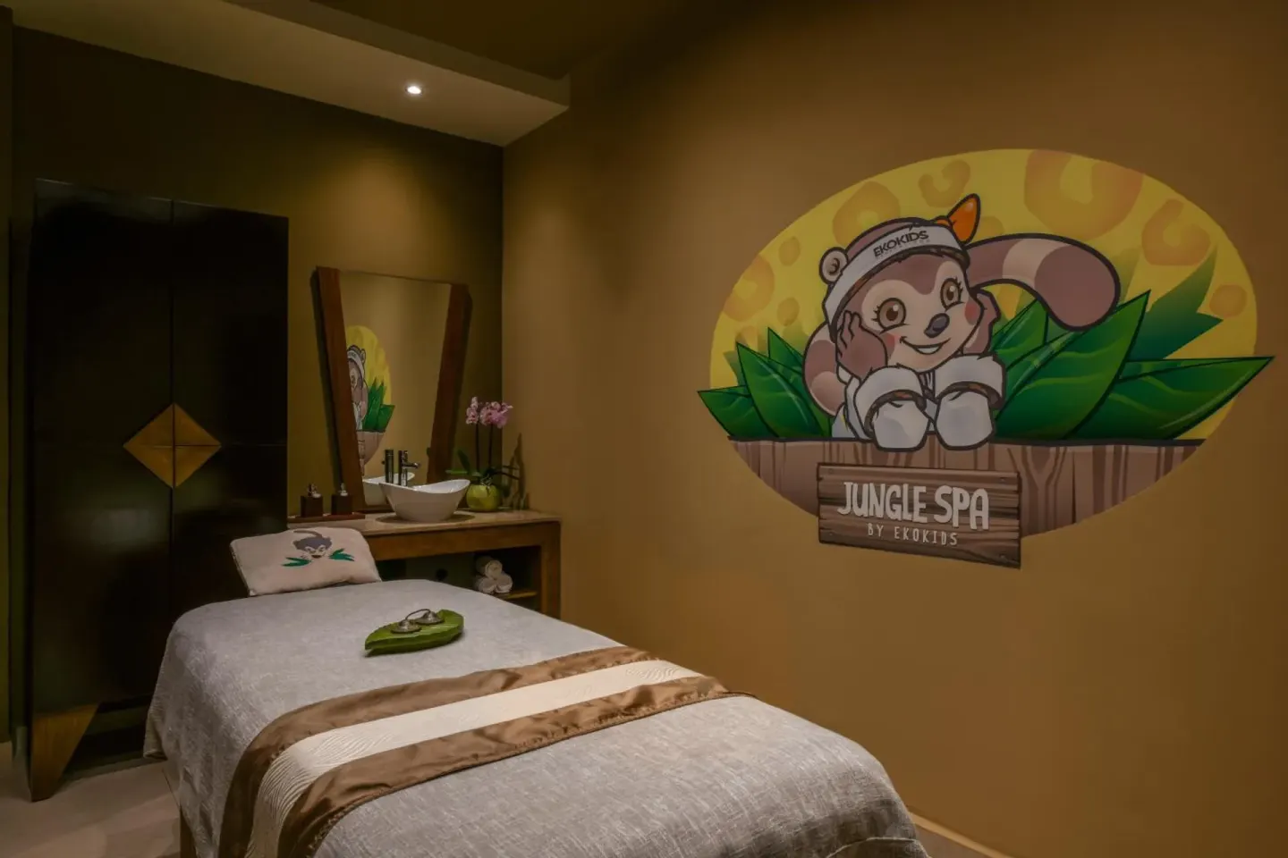 Children's spa treatment room with a massage bed at Generations Riviera Maya.
