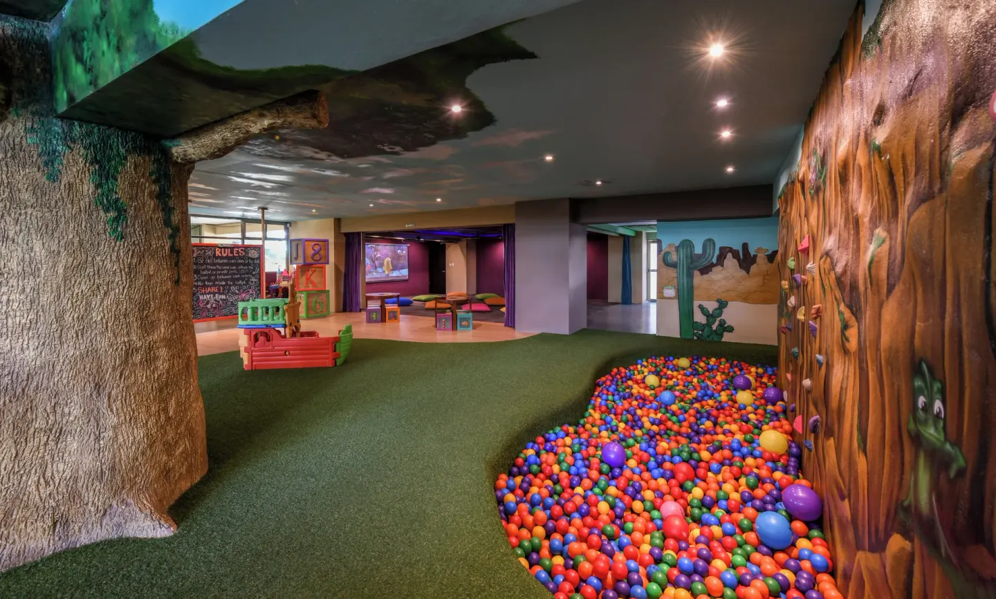 A colorful kids play area with a ball pit at Generations Riviera Maya.