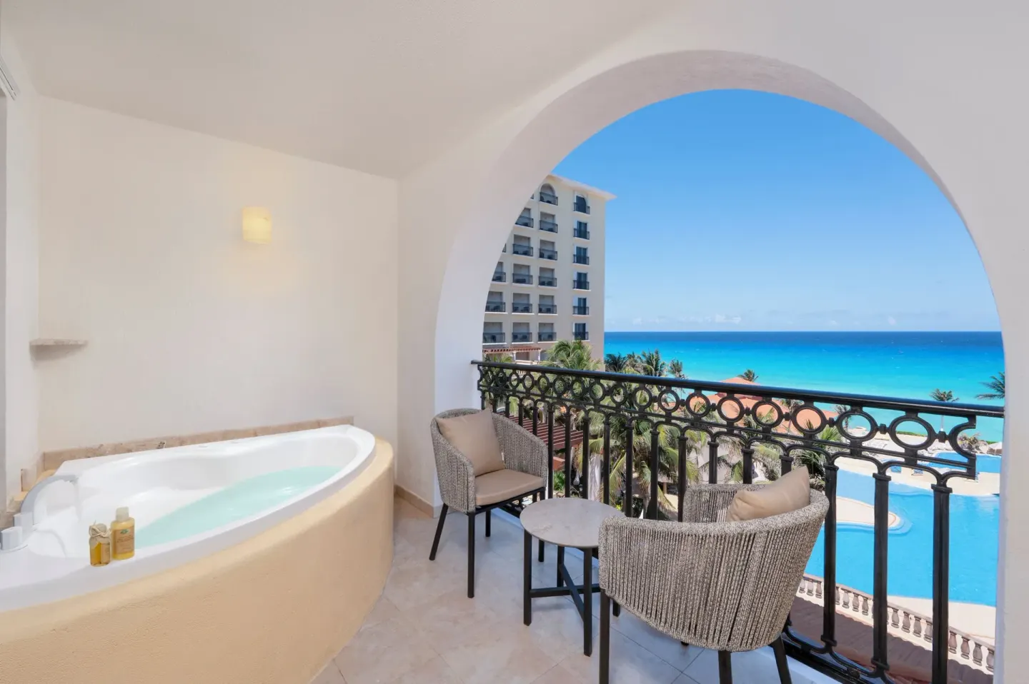 Balcony soaking tub overlooking the Caribbean at GR Solaris Cancun & Spa.