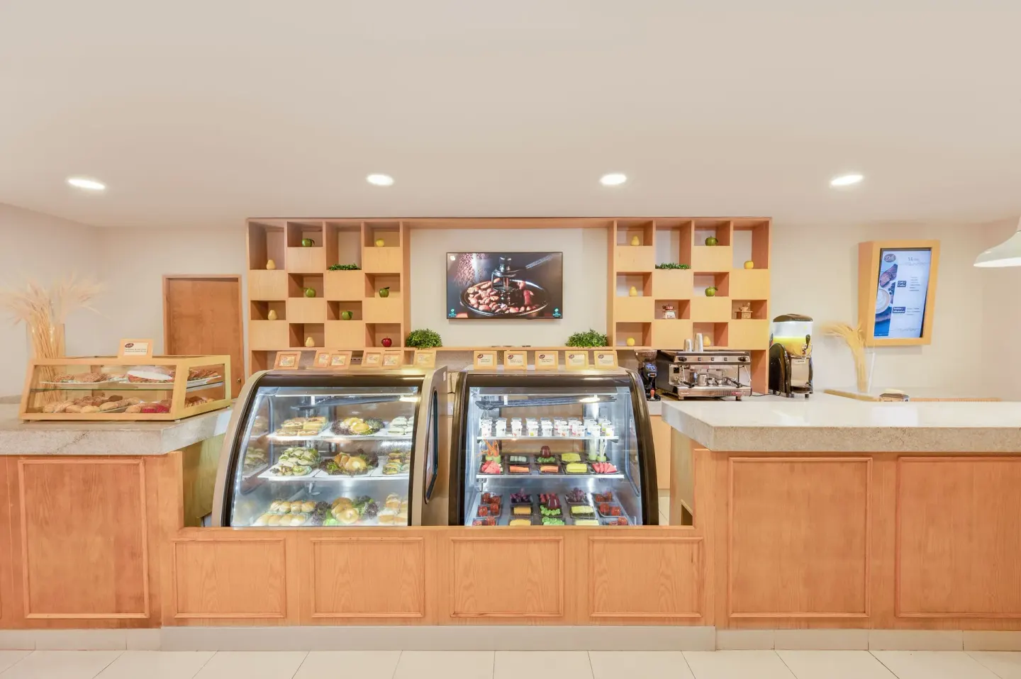 Deli counter with pastries, desserts, coffee and cold cases at GR Solaris Cancun & Spa.