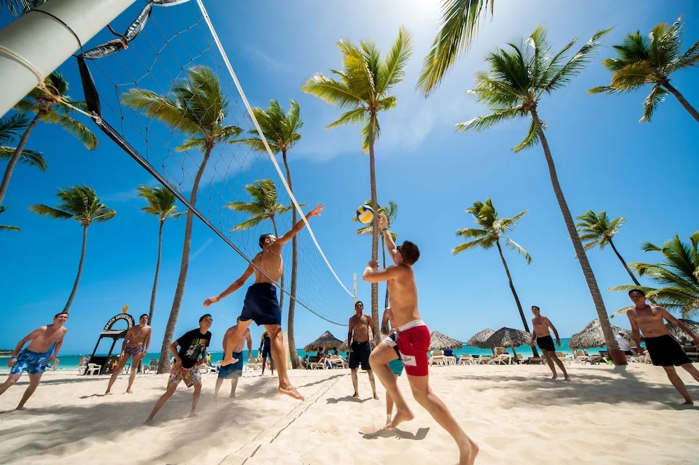Guests playing beach volleyball at Grand Bavaro Princess.
