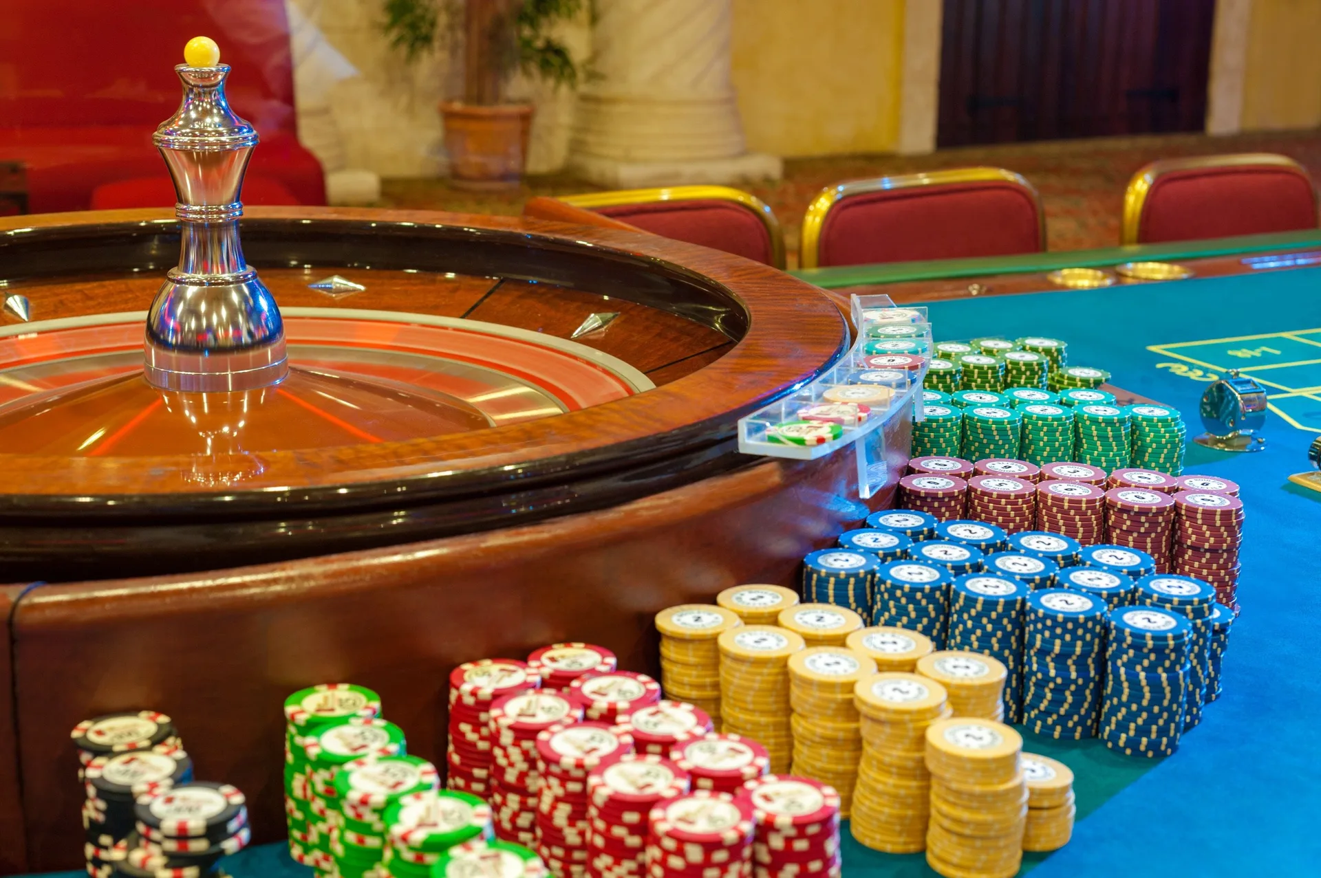 Roulette wheel and stacks of casino chips at Grand Bavaro Princess.