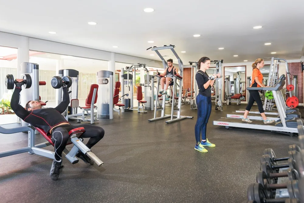 Fitness center with weights, machines and treadmills at Grand Bavaro Princess.