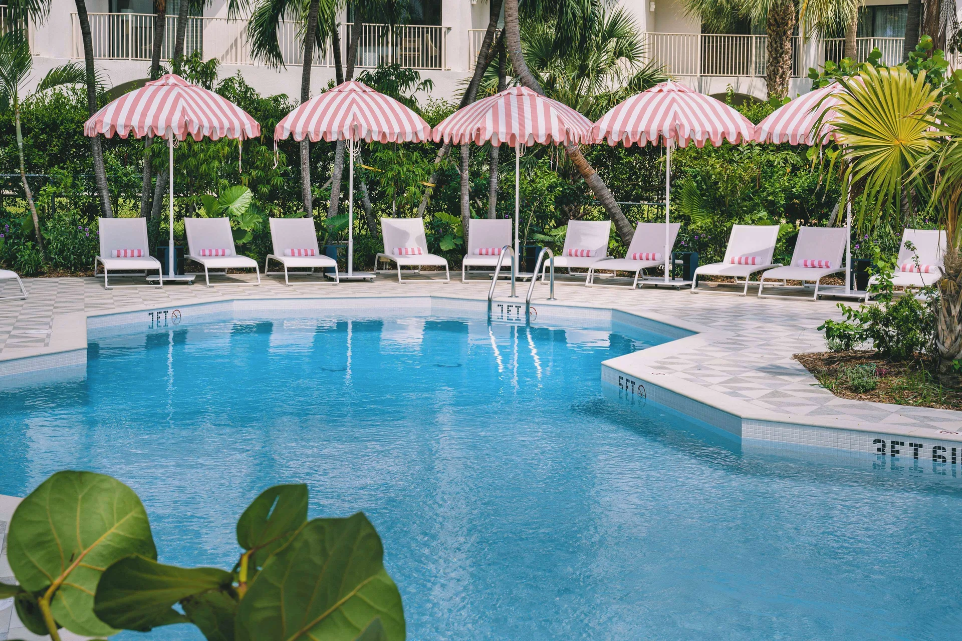 Hampton Grand Cayman Seven Mile Beach area hotel with casual style pool and island convenience