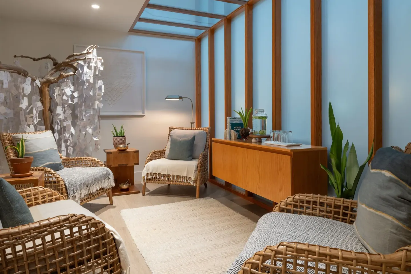 Rattan chairs and plants in a quiet spa lounge at Grand Cayman Marriott Resort.