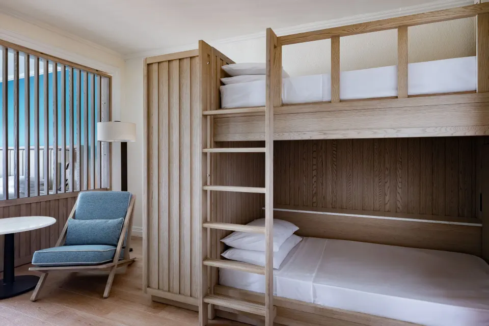 Family Suite bunk beds and seating area at Grand Cayman Marriott Resort.