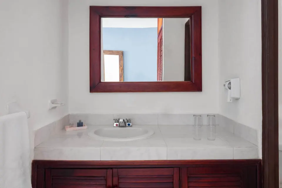 Ocean View Room bathroom vanity at Grand Decameron Complex Bucerias.