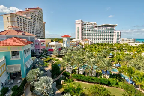 Resort towers, pastel buildings and palm-lined pools at Grand Hyatt Baha Mar.