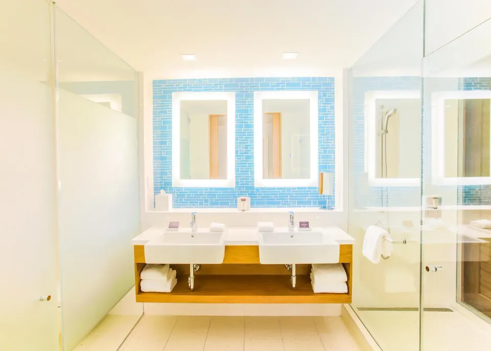 Double vanity bathroom in a Deluxe Room Ocean View residence at Grand Hyatt Baha Mar.