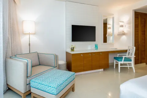 Sitting area and desk in a Deluxe Room Ocean View residence at Grand Hyatt Baha Mar.