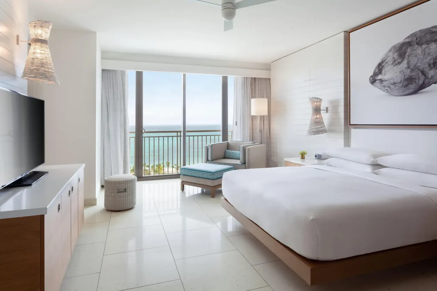 King bedroom with balcony ocean view in a residence at Grand Hyatt Baha Mar.