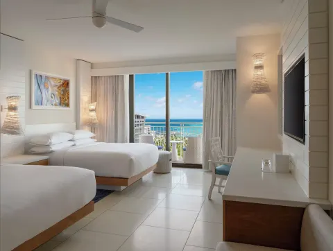 Two-bed ocean view guest room with balcony at Grand Hyatt Baha Mar.