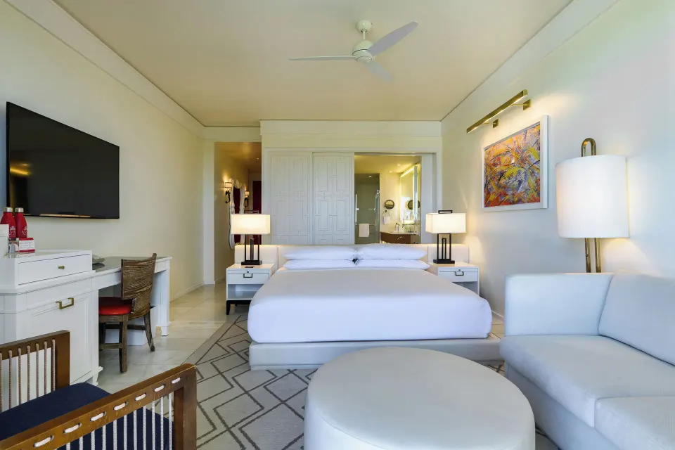 Fountain View Reserve king room with sofa seating at Grand Hyatt Baha Mar.